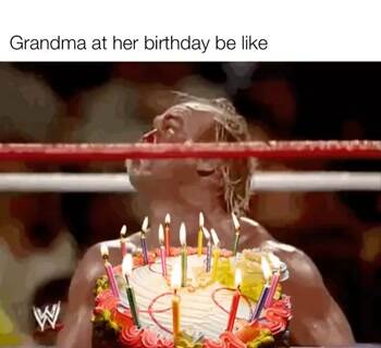 Grandma blowing out candles