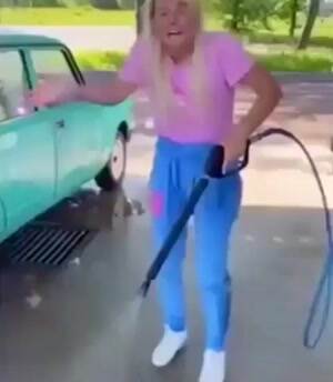 She sucks at washing the car