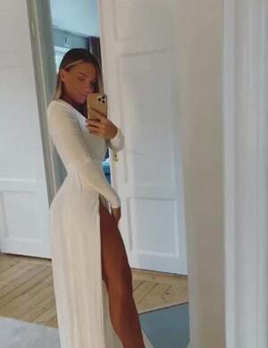 Showing off her slit