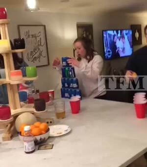 knocking down her beer tower
