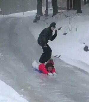 some downhill people sledding