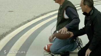 throwing a football behind a jet engine