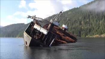 log barge dumps it