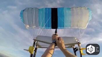 Skydiver sets their parachute on fire