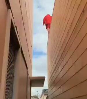 Some very strange way to get down from the rooftop