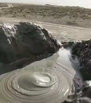 Slow motion mud volcano