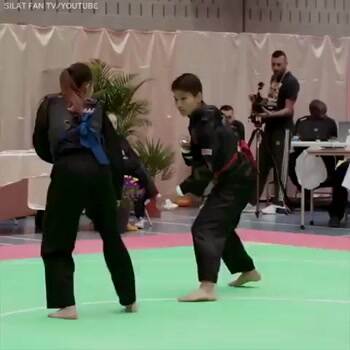 She gave him a face kickin