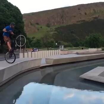 An awesome jump over the water