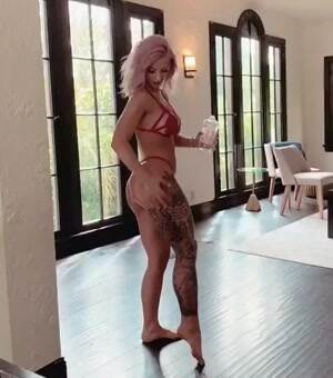 Showing off her new tattoo