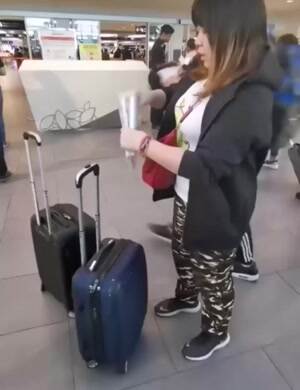 Hit her with the giant boarding pass