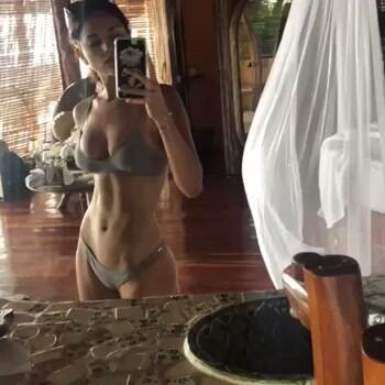 Showing off her abs selfie style