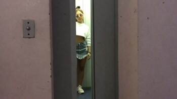 Showing off in the elevator