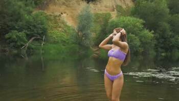 Tasia in the river