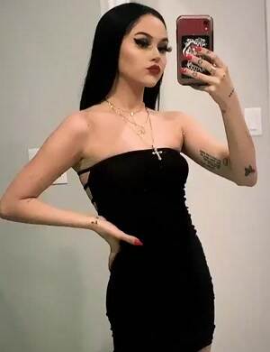 Showing off her little black dress