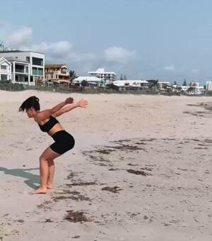 Flipping around the beach